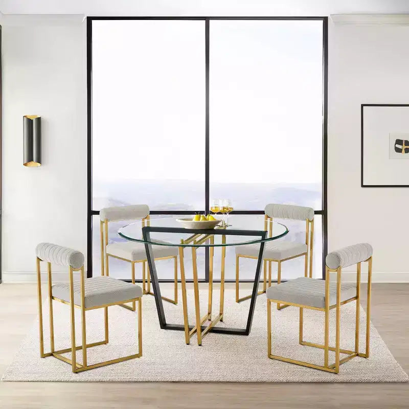 Table à manger avec plateau rond en verre et piètement en acier inoxydable brossé et fer forgé