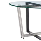Table à manger avec plateau rond en verre et piètement en acier inoxydable brossé et fer forgé