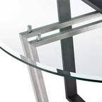 Table à manger avec plateau rond en verre et piètement en acier inoxydable brossé et fer forgé